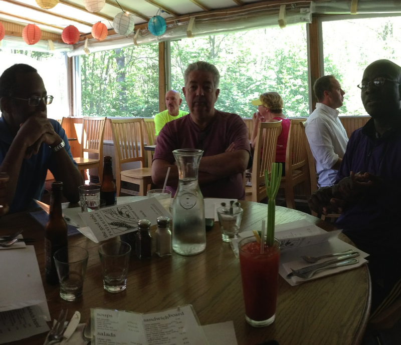 David D. Smith, executive chairman of Sinclair Broadcast Group, Inc., is flanked by Ben Carson, left, and commentator Armstrong Williams at Smith’s home in Cape Elizabeth, Maine, in July 2013. Williams was then Carson’s business manager. Carson has since become secretary of Housing and Urban Development.